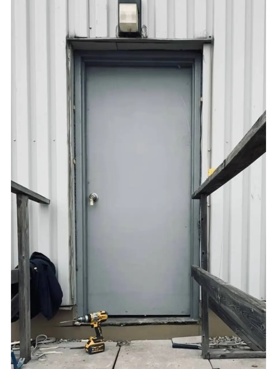 Exterior metal security door replaced in Richmond Hill with stronger fit and hardware