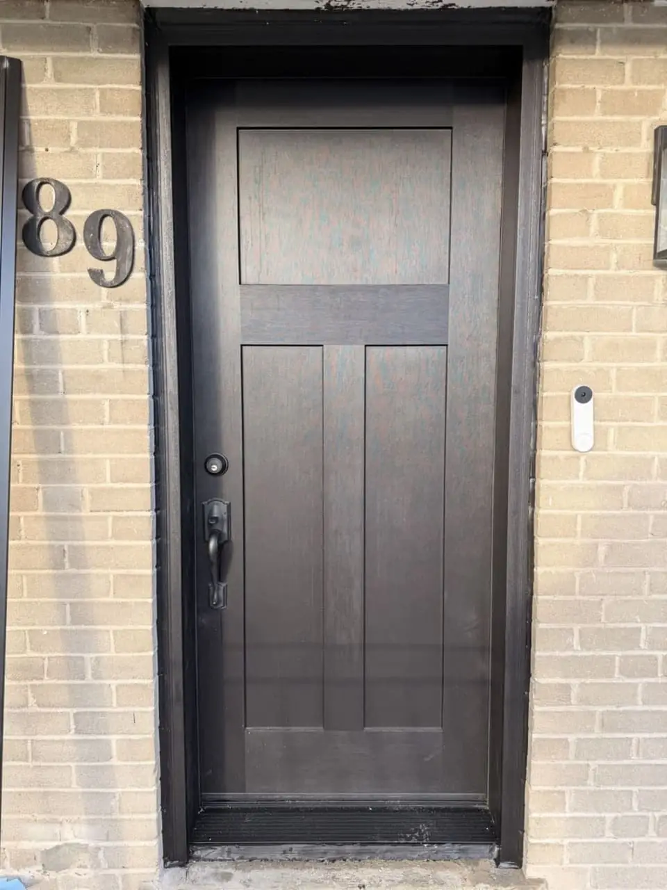 Solid privacy front door installed in Oakville with cleaner lines and better sealing