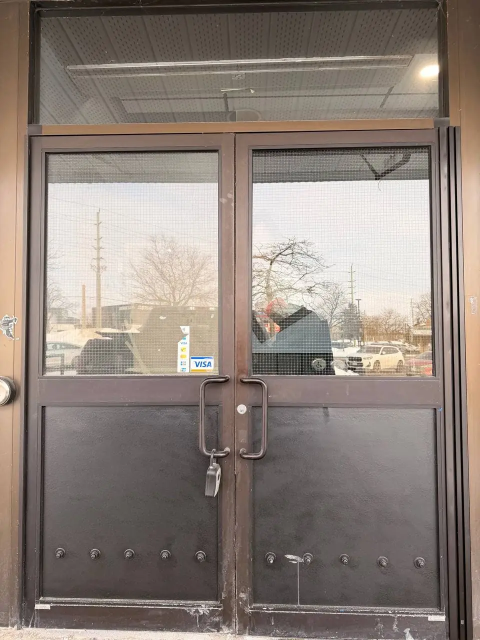 Pickering commercial entrance after GPW glass replacement and service to the existing continuous hinge