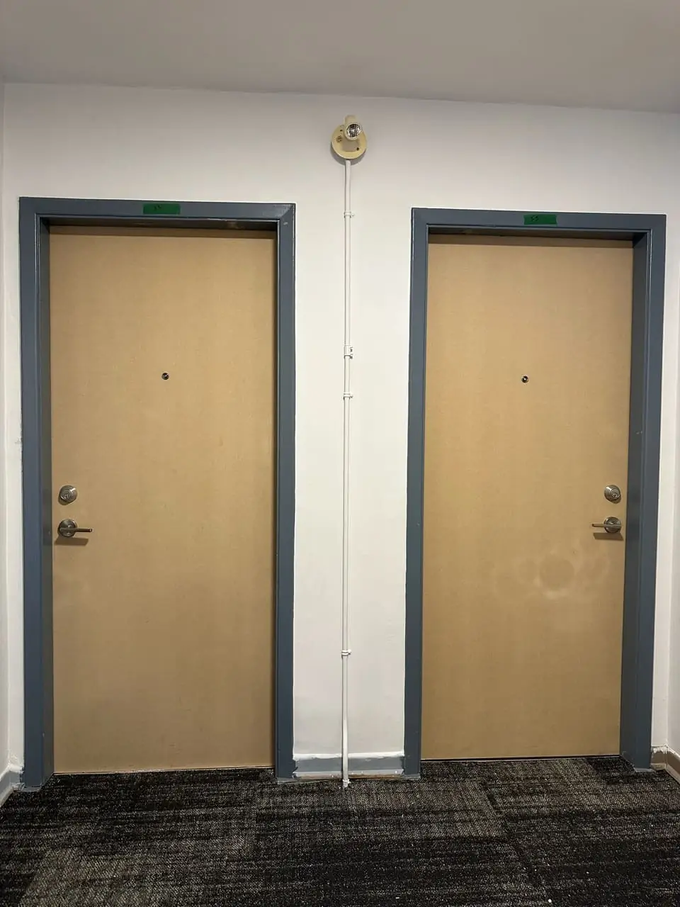 Office room doors replaced in a Vaughan commercial corridor with cleaner fit and hardware