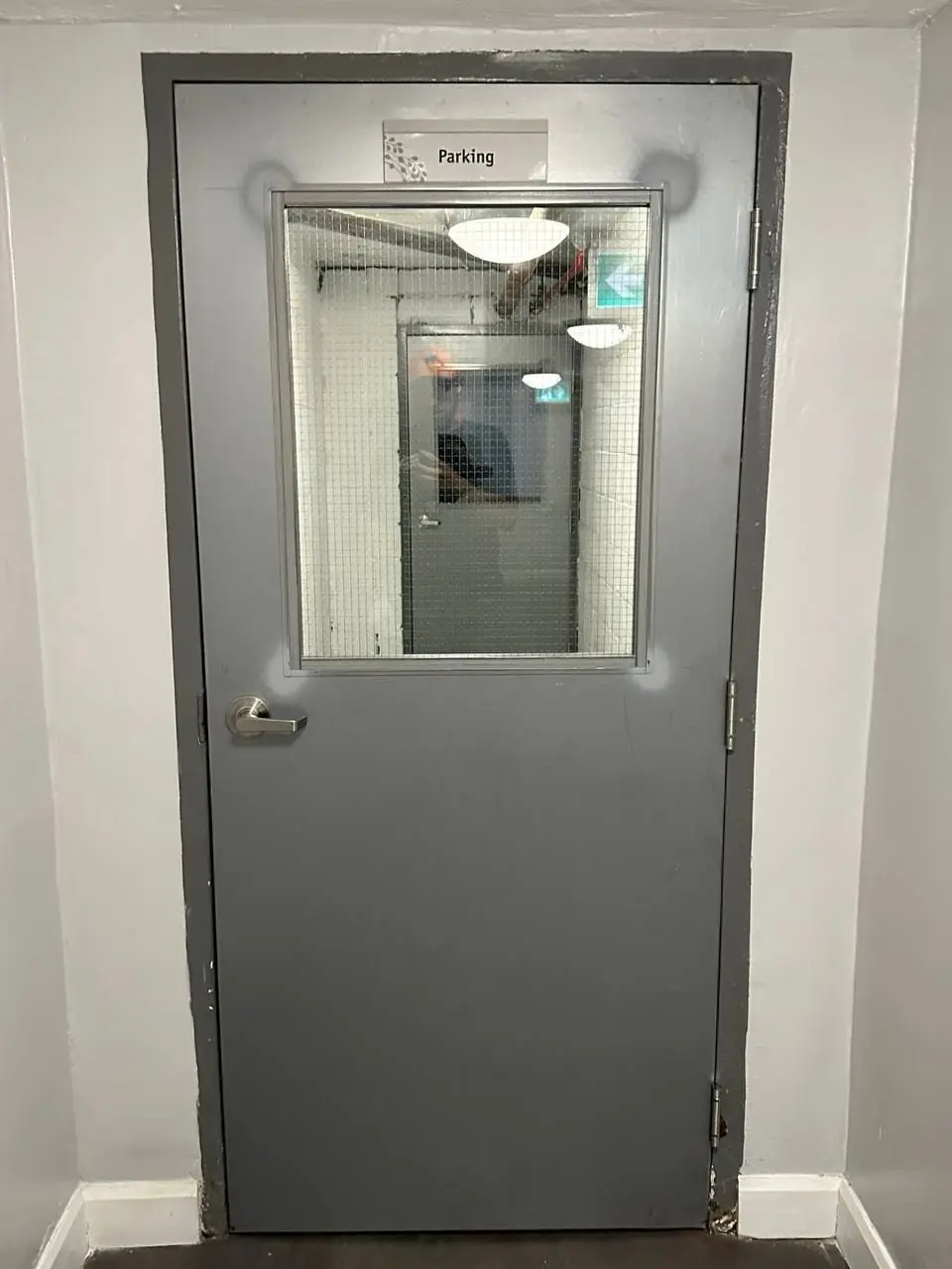 Second commercial parking-access door with a GPW vision lite in Whitchurch-Stouffville.