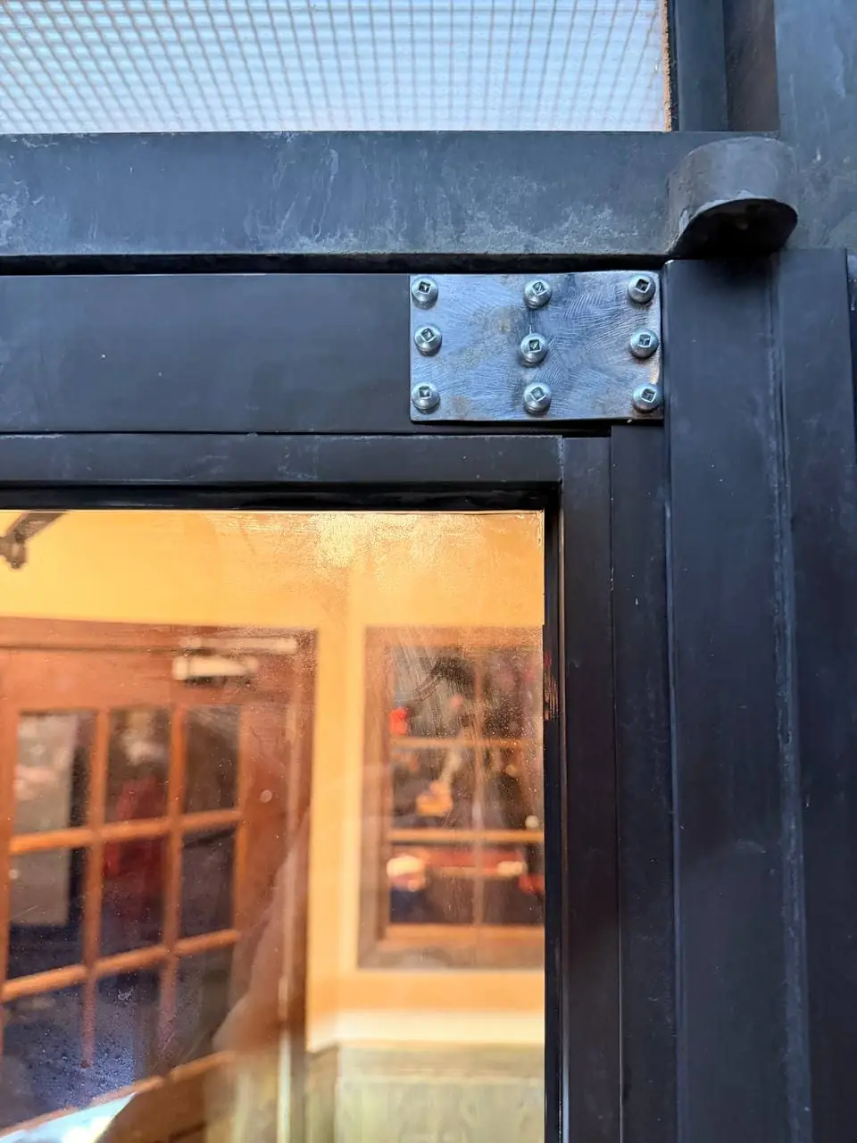Repaired commercial door at Occasions Restaurant on Eastwood Rd