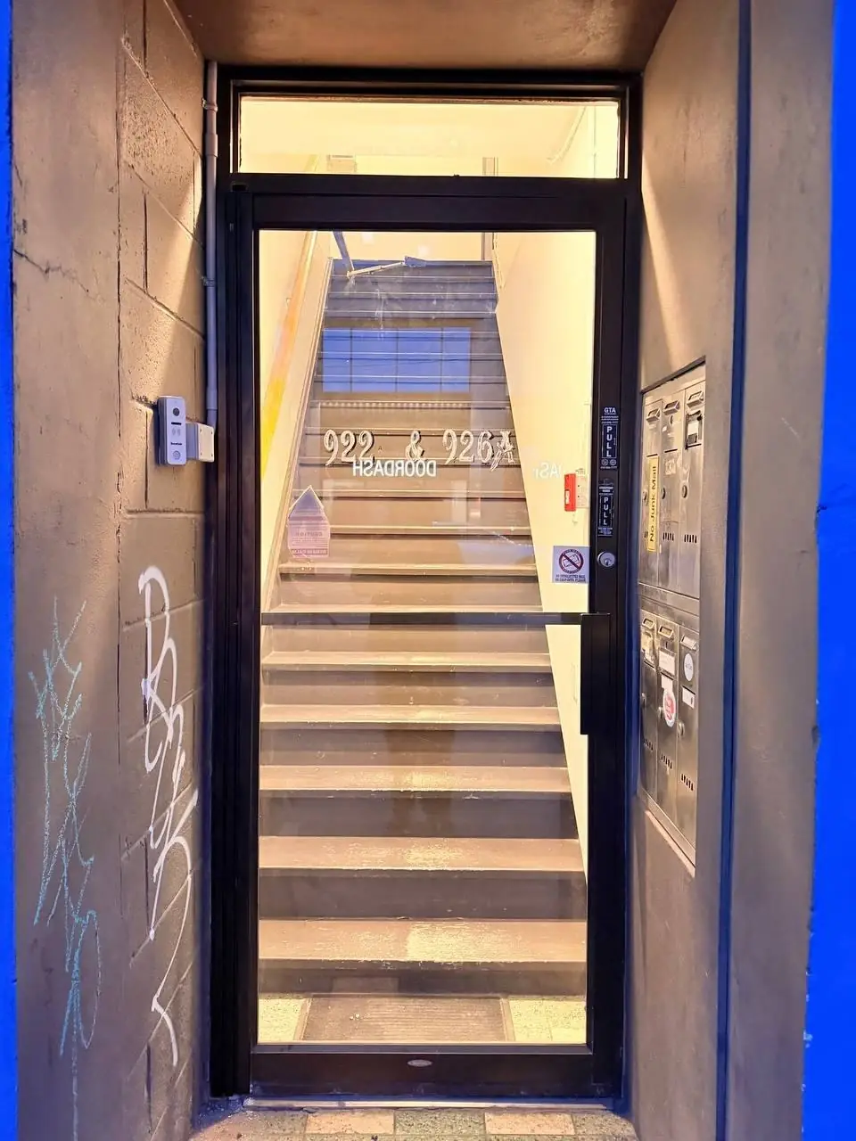 New aluminum framed glass stairwell entrance door installed in Pickering