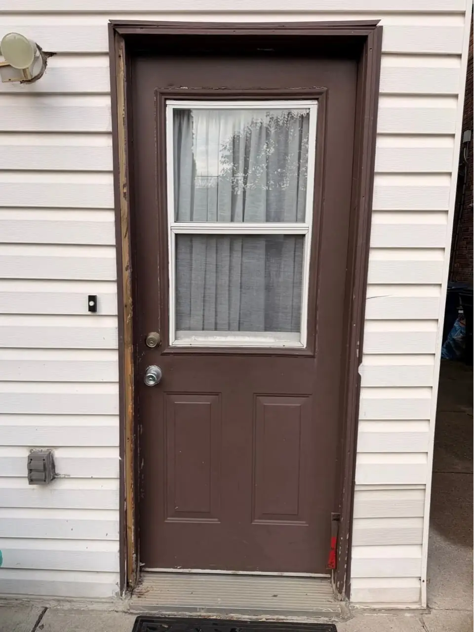 Drafty old front door in Milton before insulated steel entry replacement