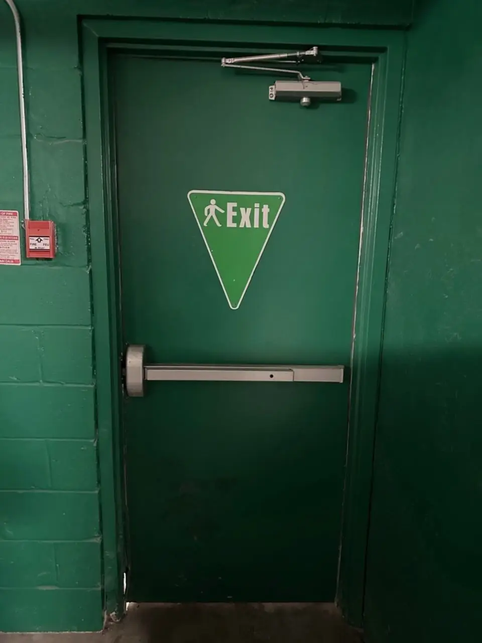 Before metal emergency exit door replacement on Black Creek Dr near North Keelesdale Park in Toronto