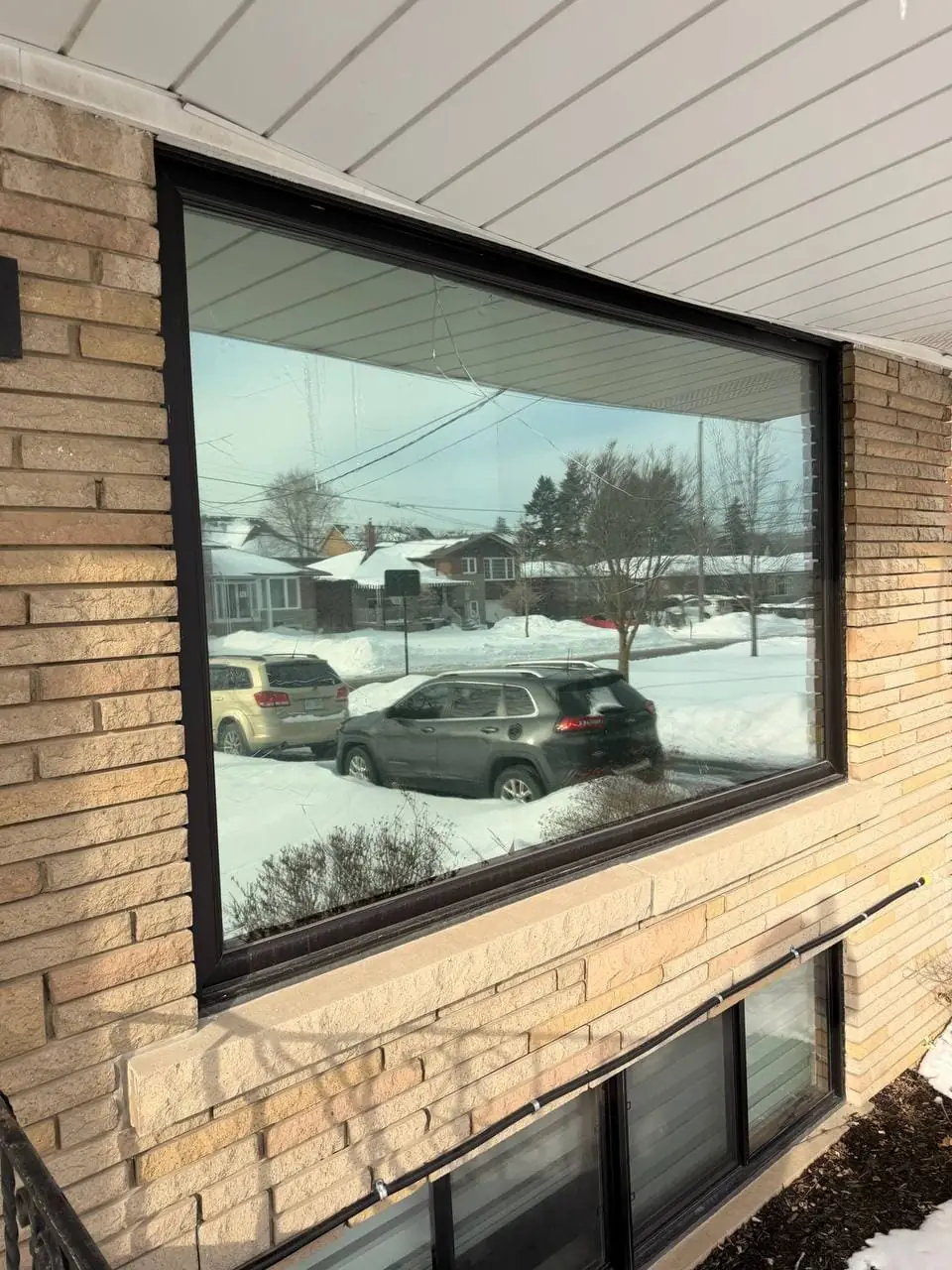 Broken window glass in North York before replacement without frame removal.