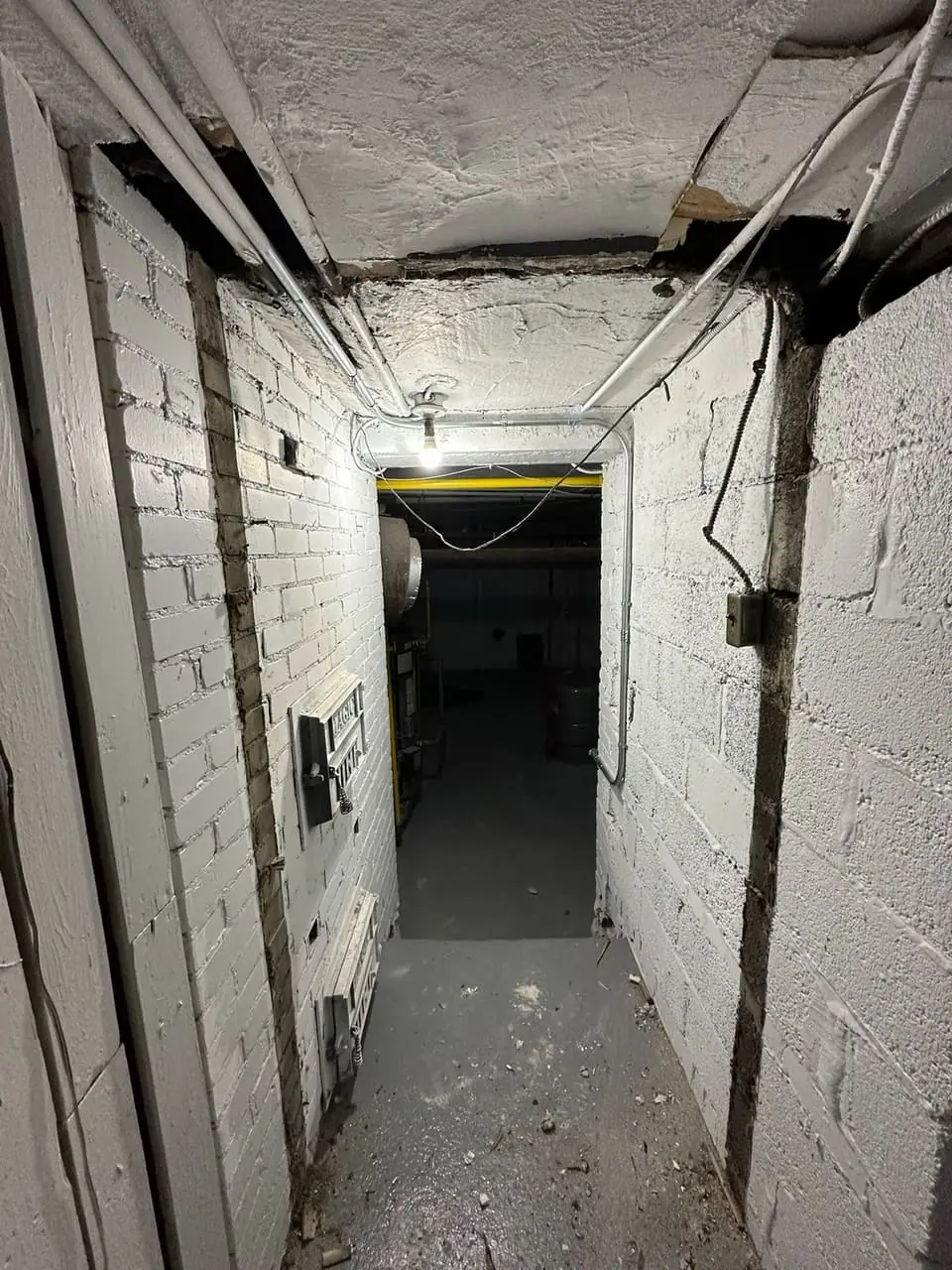 Burlington basement service opening before fire-rated steel door installation