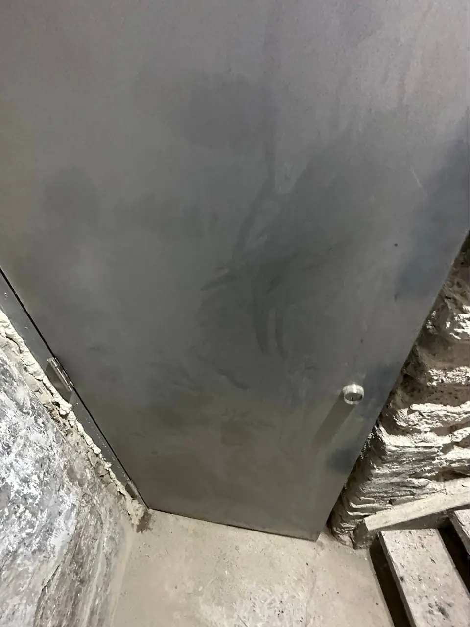 Brock Township metal exit door before push bar and panic hardware installation