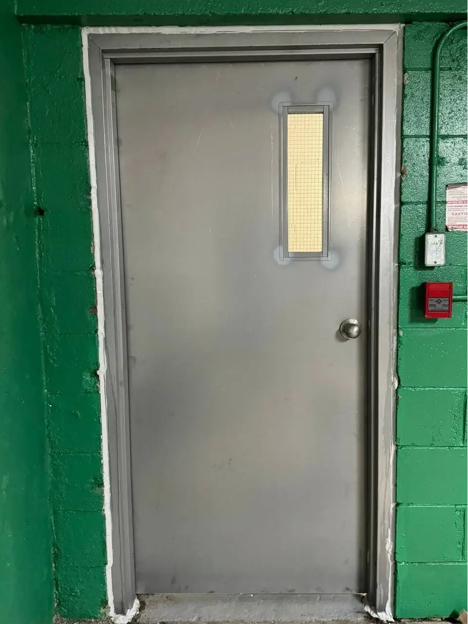King City commercial door with a vision lite shown at the opening.