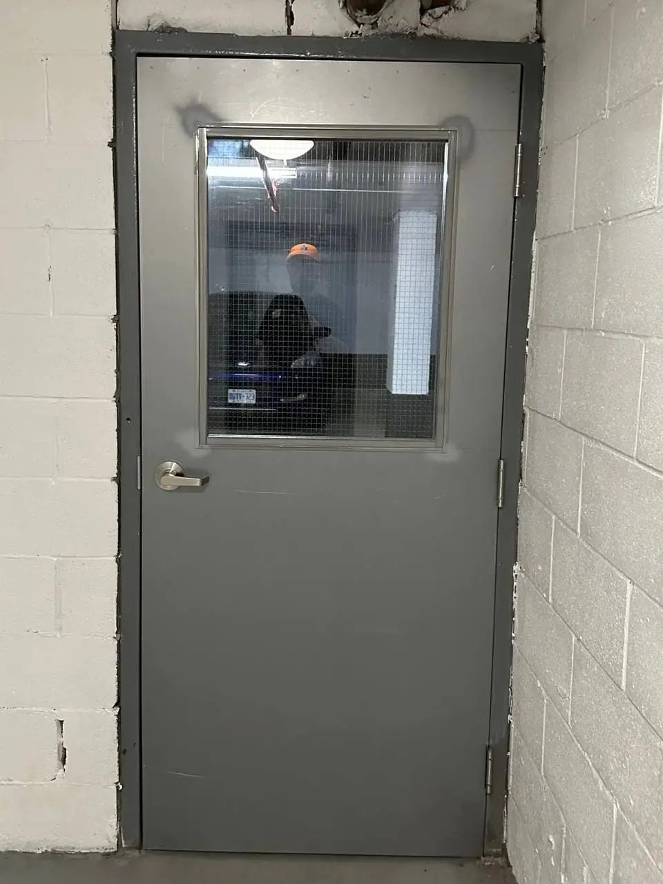 First commercial parking-access door with a GPW vision lite in Whitchurch-Stouffville.