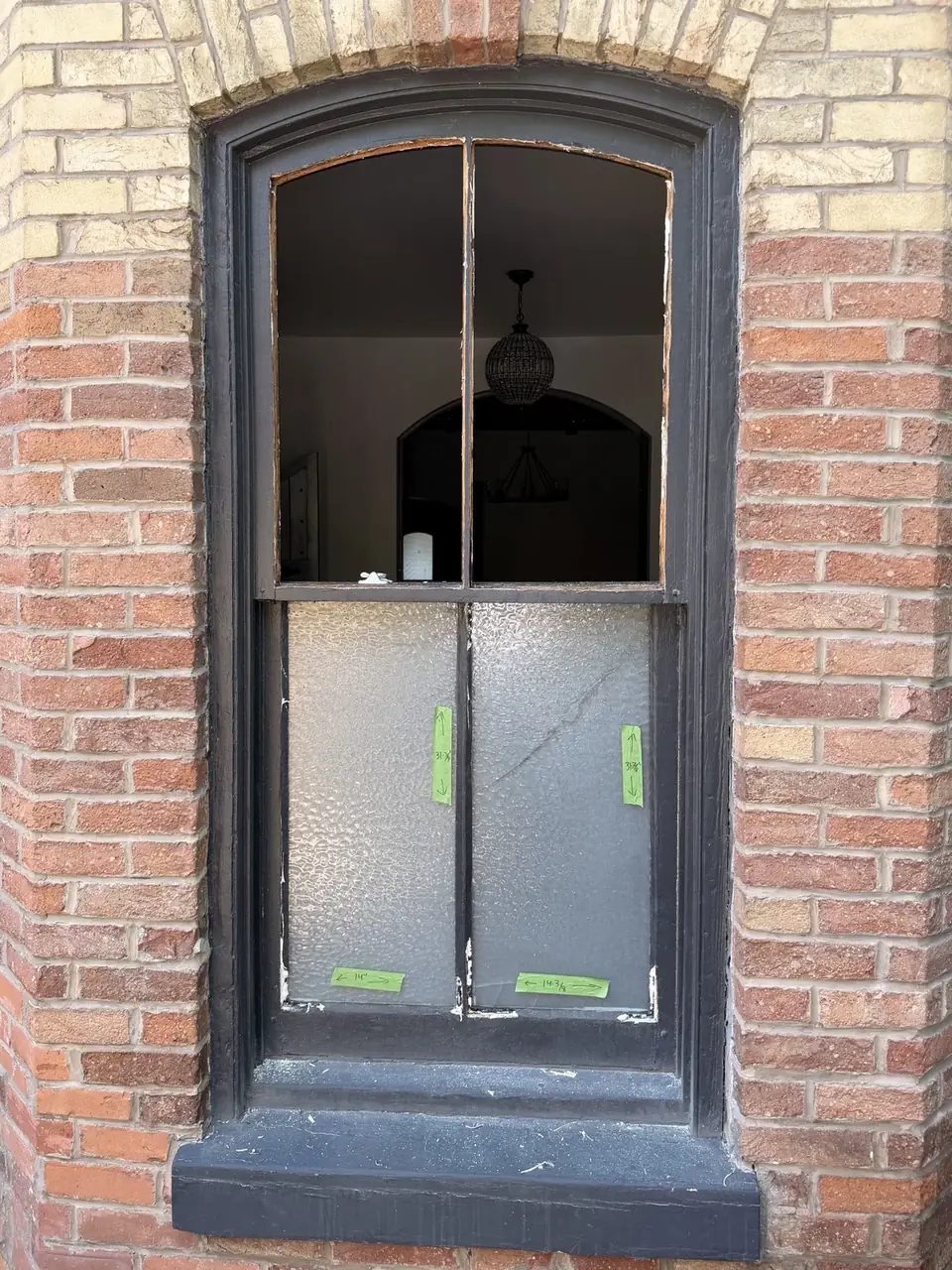 Old wooden window before glass replacement and restoration in Cabbagetown Toronto
