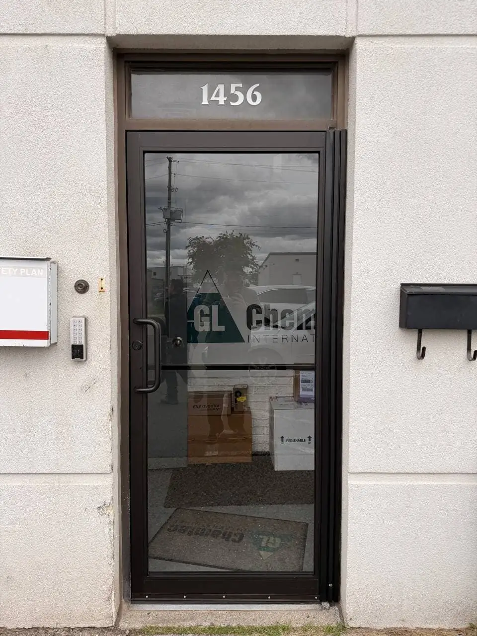 Toronto business entrance door after full-length continuous geared hinge installation and realignment