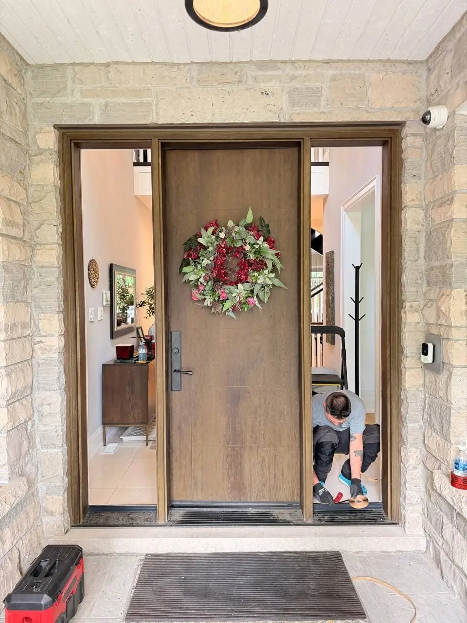 Sidelight glass replacement in progress beside the Halton Hills entry door.