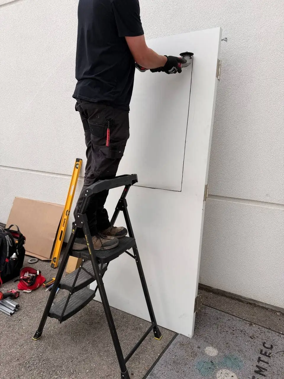 GPW wired-glass vision-lite work in progress on the Richmond Hill metal door.