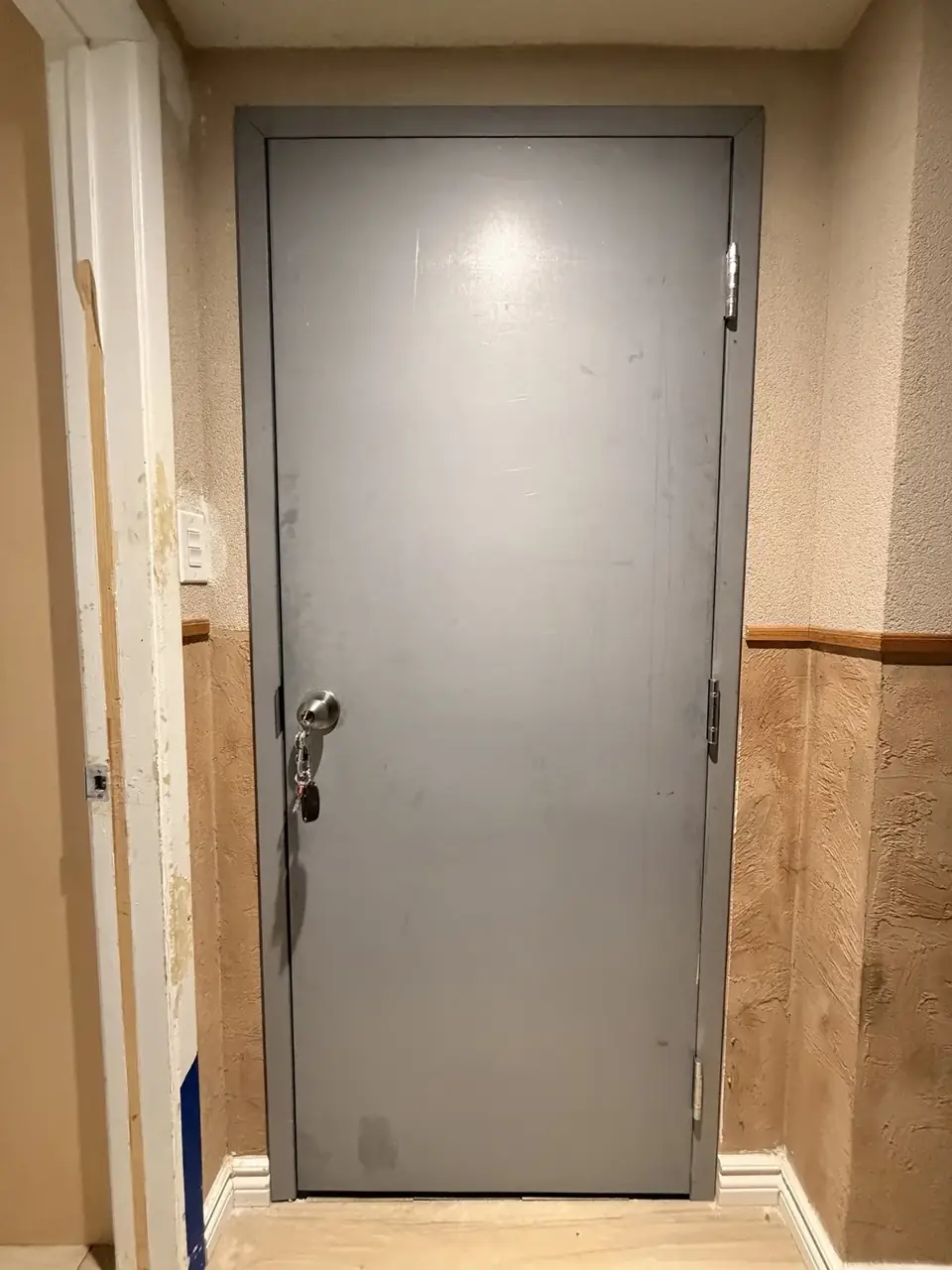 New grey metal door and metal frame installed in Mississauga