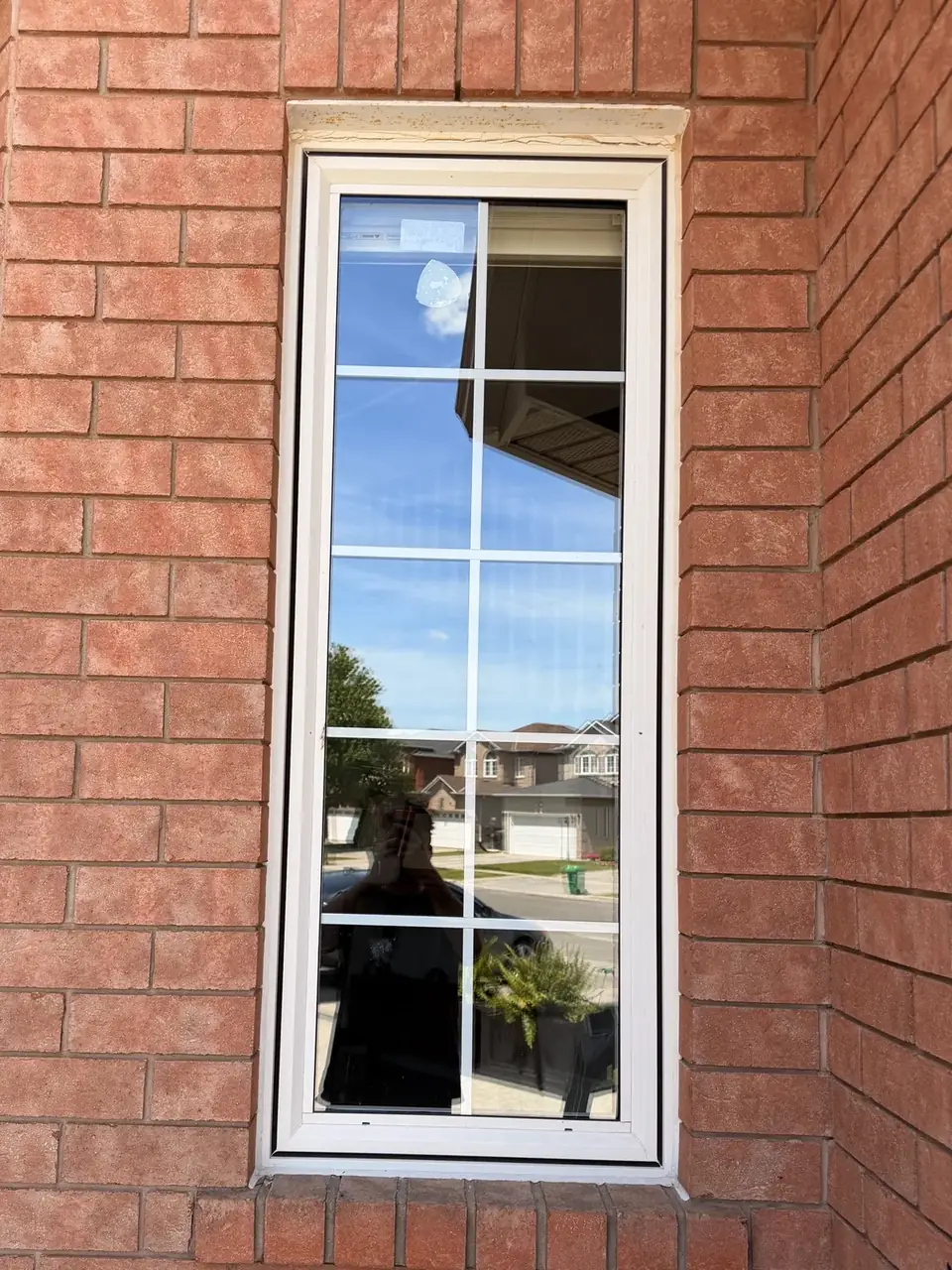 New insulated window glass with internal decorative grille installed in Bolton